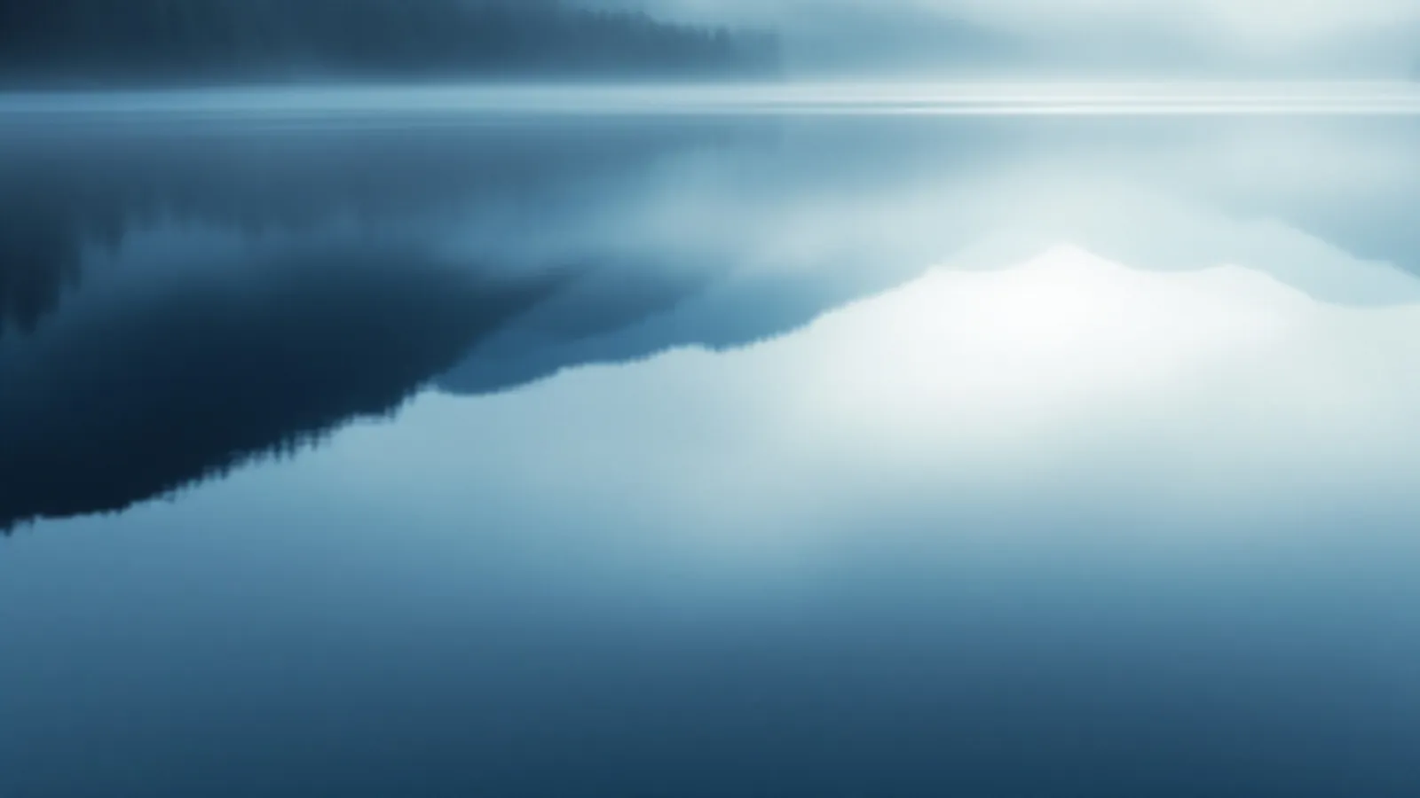 Silver morning light reflecting off a still lake surrounded by misty hills, the ChromeFunds view of fast personal loans online, $100 – $5,000
